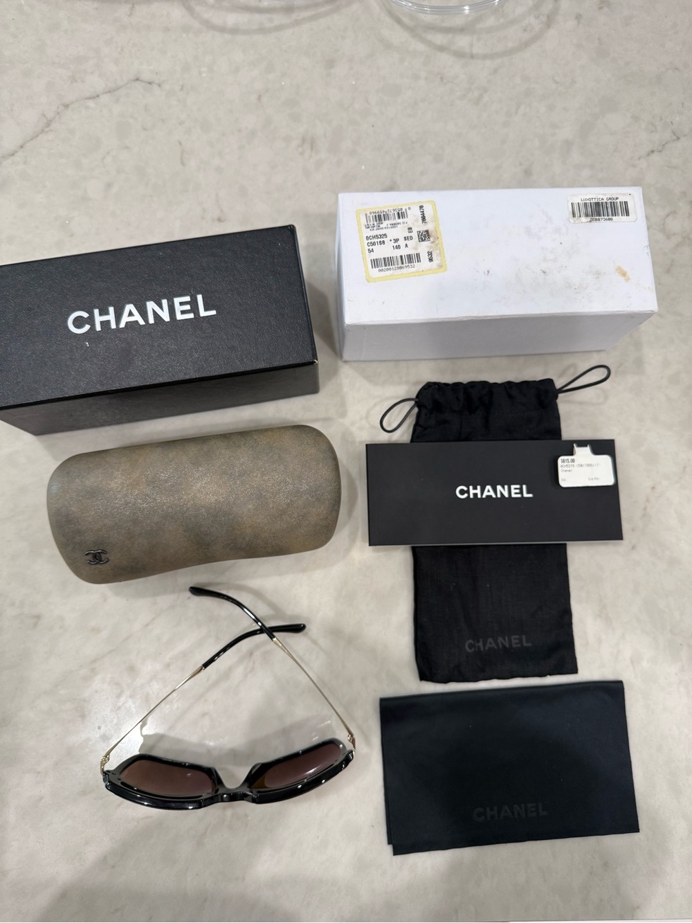 CHANEL Black Frame Sunglasses with Brown Gradient Lenses